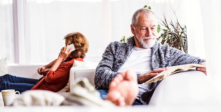 senior couple relaxing at home