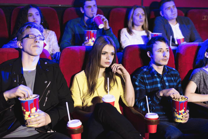 Friends in a movie theater